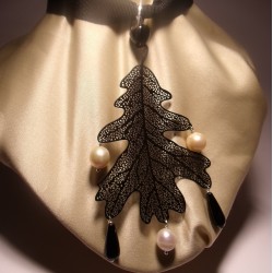 Metal leaf pendant with onyx and pearls