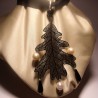 Metal leaf pendant with onyx and pearls