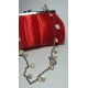 Red satin clutch with mother of pearl and white pearls